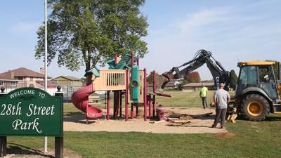 Photos: Crews replace playground, lighting at city parks in Peru