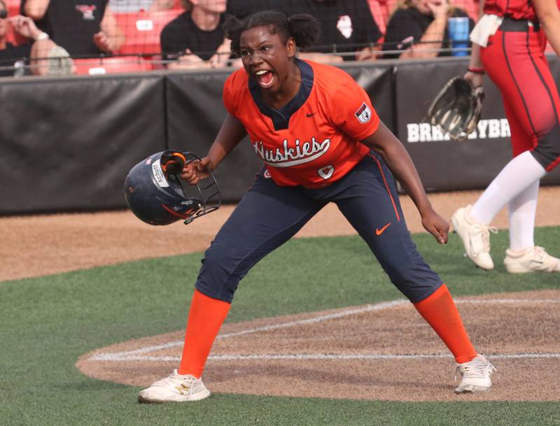 Oak Park-River Forest's Tyler Brock reacts after scoring a run against Yorkville during the Class 4A State semifinal softball game on Friday, June 9, 2023 at the Louisville Slugger Sports Complex in Peoria.