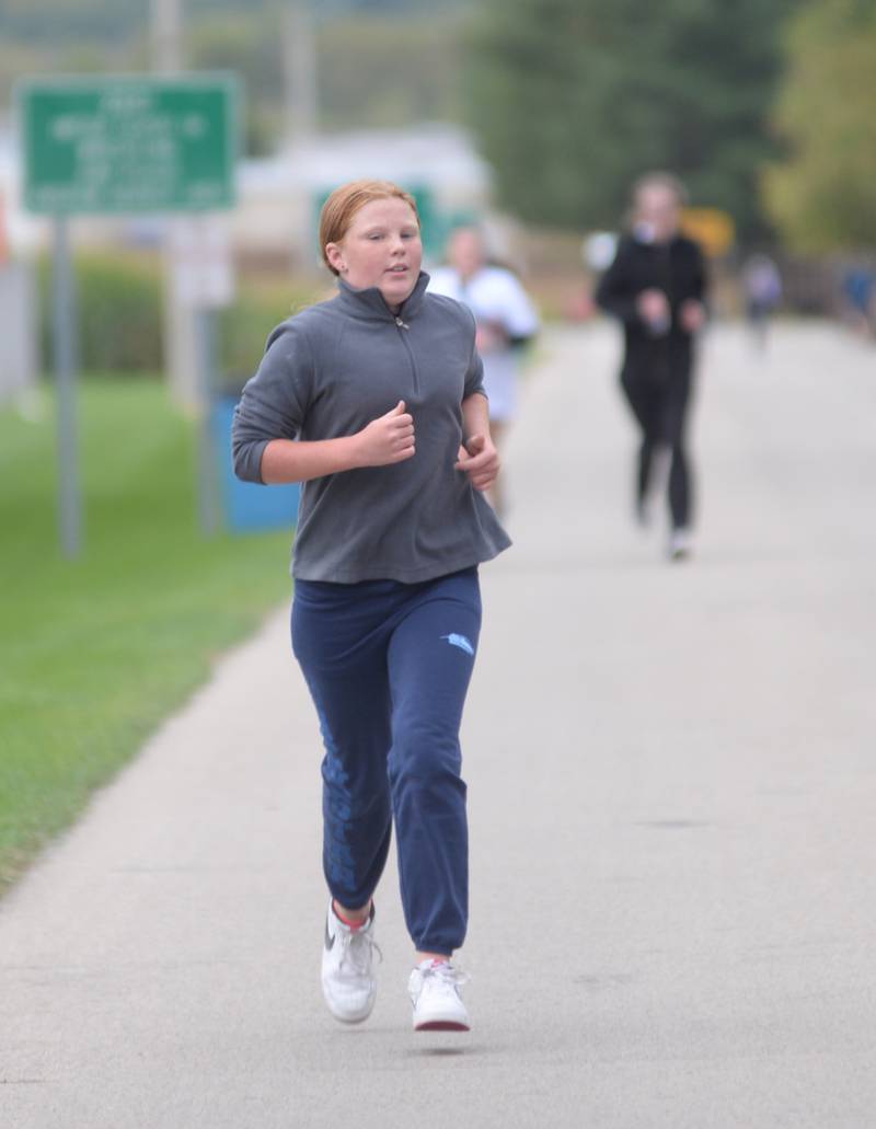 Tressa Bruns, 12, of Oregon heads to the finish line in the 1-Mile Fun Run during Autumn on Parade on Sunday, Oct. 8 at Oregon Park West.