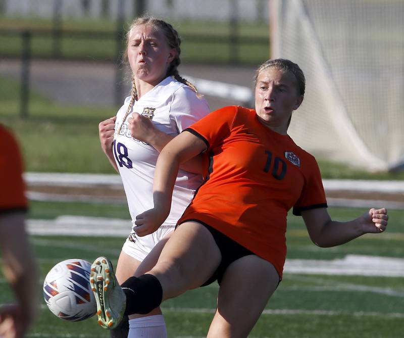 Crystal Lake Central's Brooklynn Carlson (right) tries to control the ball in front of Wauconda's Sophie Kloss during the IHSA Class 2A Grayslake North Regional championship soccer match on Friday, May 17, 2024, at Grayslake North High School.