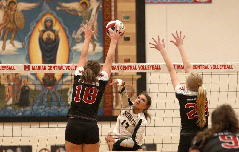 Grayslake North’s Maddie Von Allmen sends the ball over the net against Marian Central in girls volleyball in Woodstock Monday.