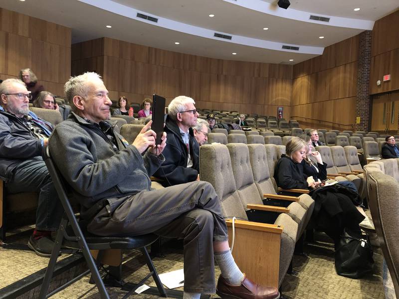 Audience members listen to information about the McHenry County Mental Health Board sales tax referendum Feb. 22, 2024