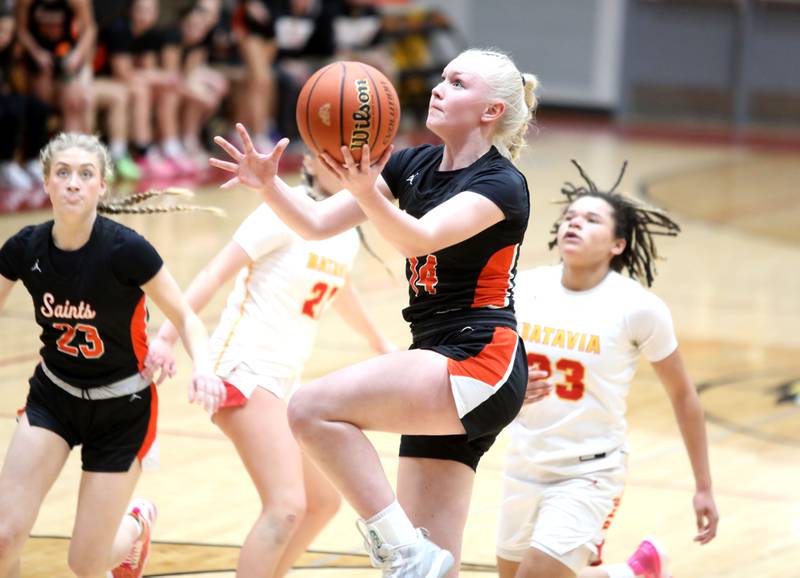 St. Charles East’s Addie Schilb gets the ball to the basket during a Class 4A Batavia Sectional semifinal game against Batavia on Tuesday, Feb. 20, 2024.