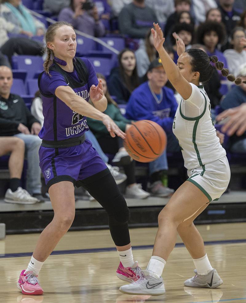 Dixon’s Katie Drew makes a pass against Boylan Friday, Feb. 16, 2024 at the class 3A Rochelle girls basketball regional.