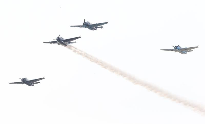 TBM Avengers perform a missing man formation as part of an aerial salute during the TBM Avenger Reunion on Friday, May 19, 2023 at the Illinois Valley Regional Airport in Peru.