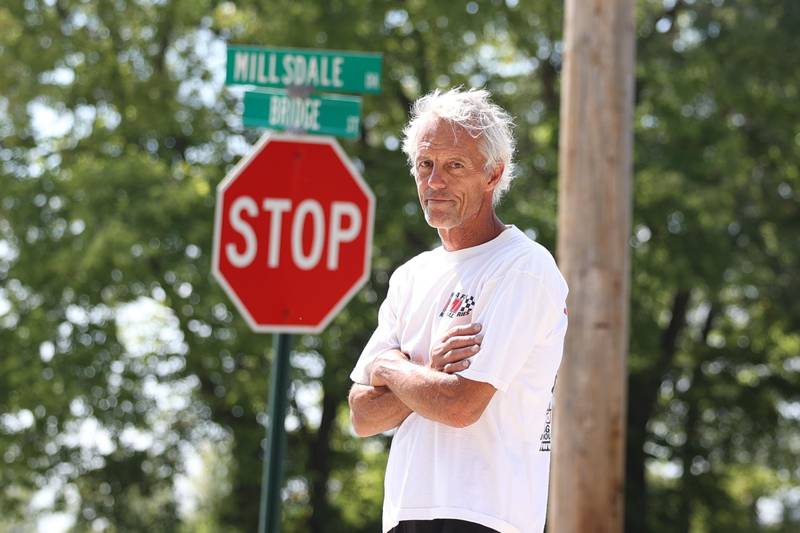 Joe Jenkins stands at the intersection of Millsdale Drive and Bridge Street on Thursday, Sept. 5, 2024 in Elwood. Elwood resident Jenkins has voiced complaints about the truck traffic along Millsdale Drive.