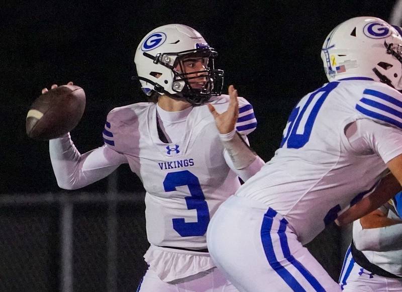 Geneva’s Nate Stempowski (3) sits in the pocket and looks downfield against Wheaton North during a football game at Wheaton North High School on Friday, Oct. 6, 2023.