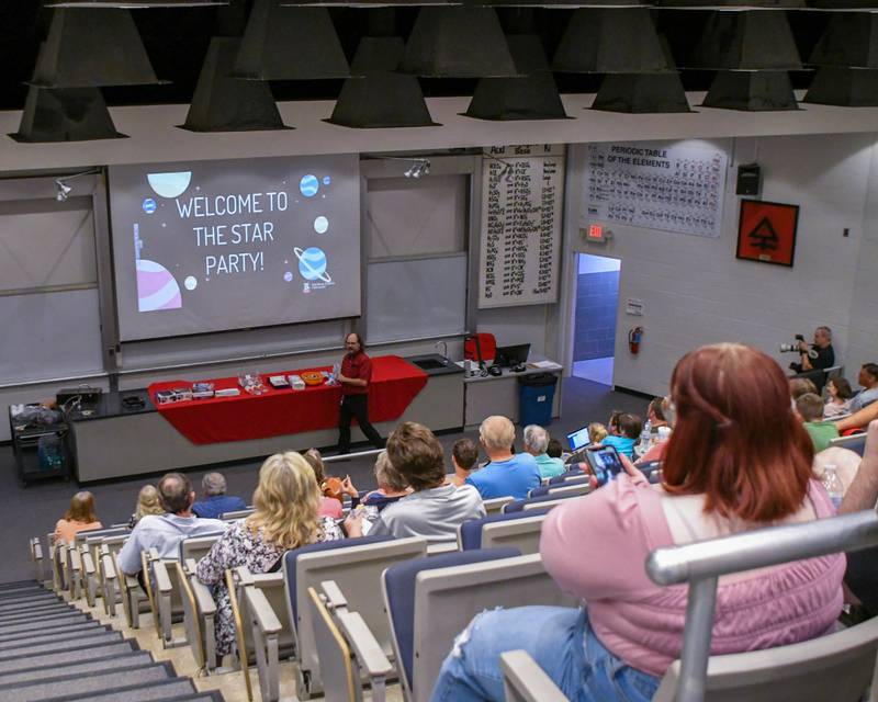 On Wednesday, Aug. 2, 2023, Northern Illinois University lab manager Jeremy Benson gives a presentation about Davis Hall on the and the history of the DeKalb observatory before showing off the telescope to those who wanted to take the climb. The university hosted a Star Party to mark the observatory reopening after a 3-year hiatus due to the COVID-19 pandemic.