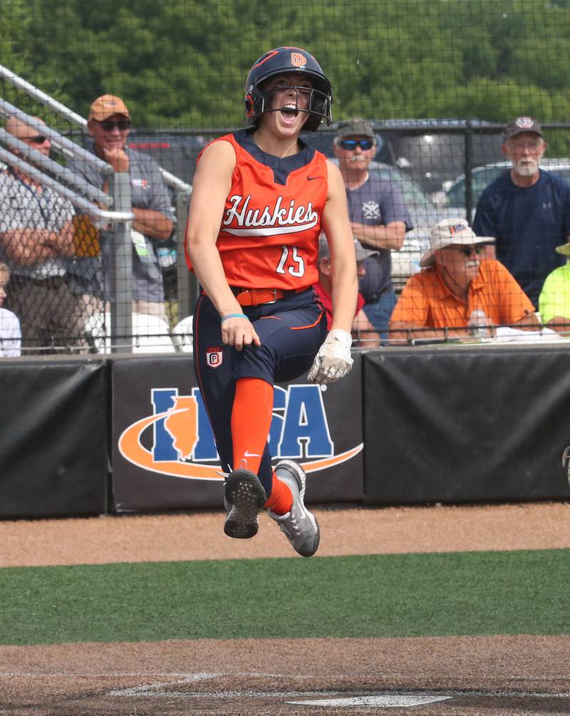 Oak Park-River Forest's Gloria Hronek reacts after scoring the first run against Yorkville during the Class 4A State semifinal softball game on Friday, June 9, 2023 at the Louisville Slugger Sports Complex in Peoria.