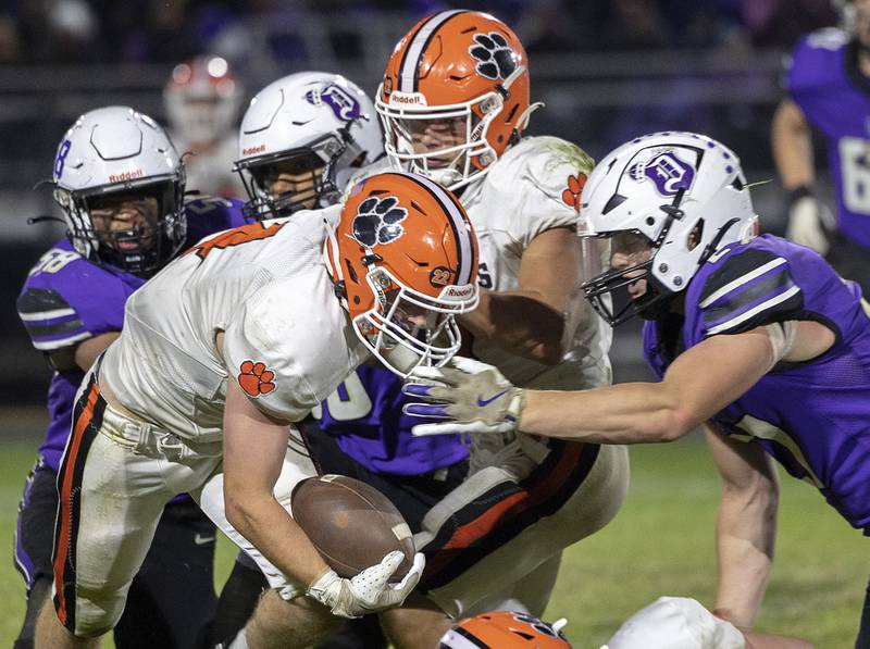 Byron’s Dawson Criddle looks for yards against the Dixon defense Friday, Oct. 18, 2024, at A.C. Bowers Field in Dixon.