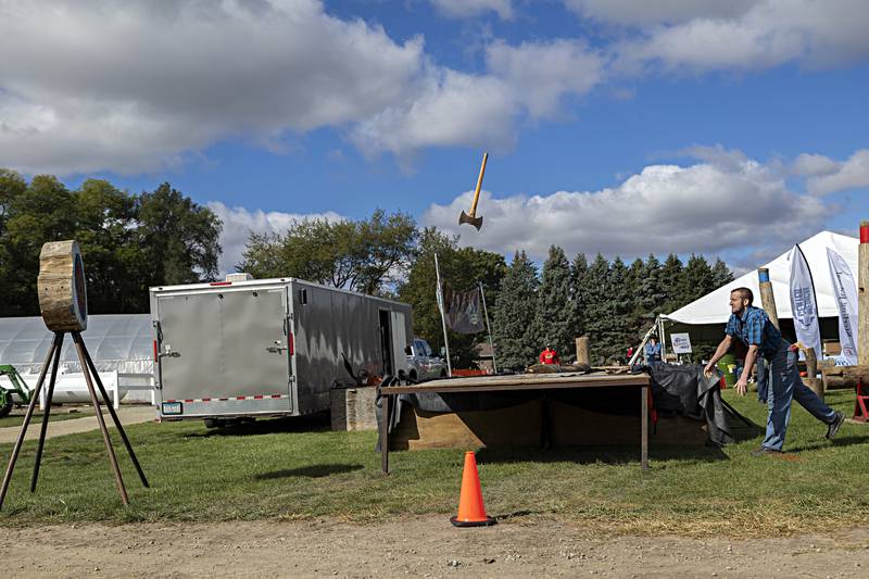 Tyler Berard fires his axe at the target during the Lumberjack show Saturday, Oct. 7, 2023 in Rock Falls.