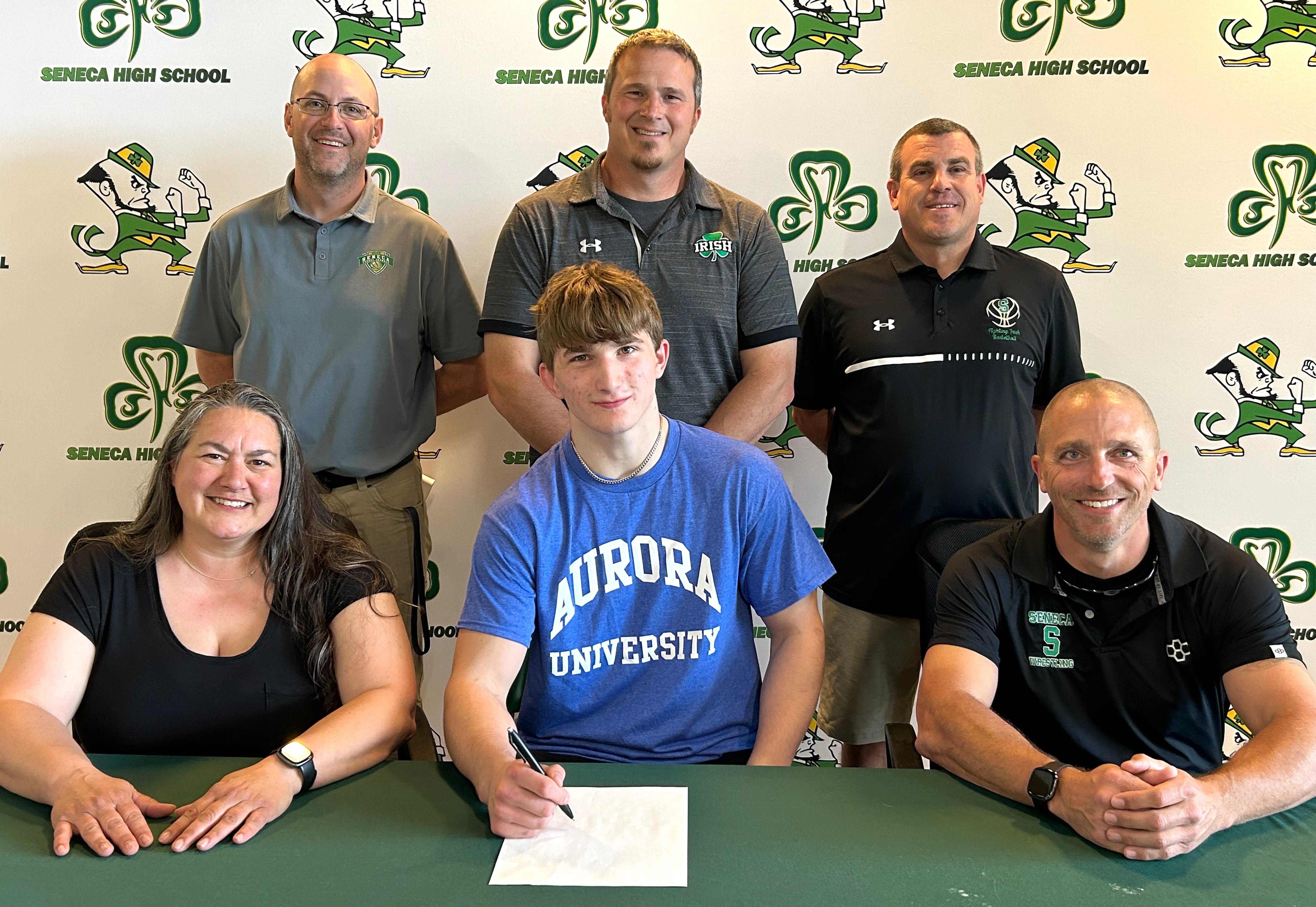 Recent Seneca graduate Asher Hamby has signed to continue his education at Aurora University and his football career at the NCAA Division III level with the Spartans. Hamby was a running back/strong safety for the Fighting Irish and three-time first-team selection to The Times All-Area Football Team. Pictured at his signing ceremony are (from left, front) are Jenny Keedy, Asher Hamby, Bill Hamby along with (from left, back) Levi Derber, Terry Maxwell and Ted O’Boyle.