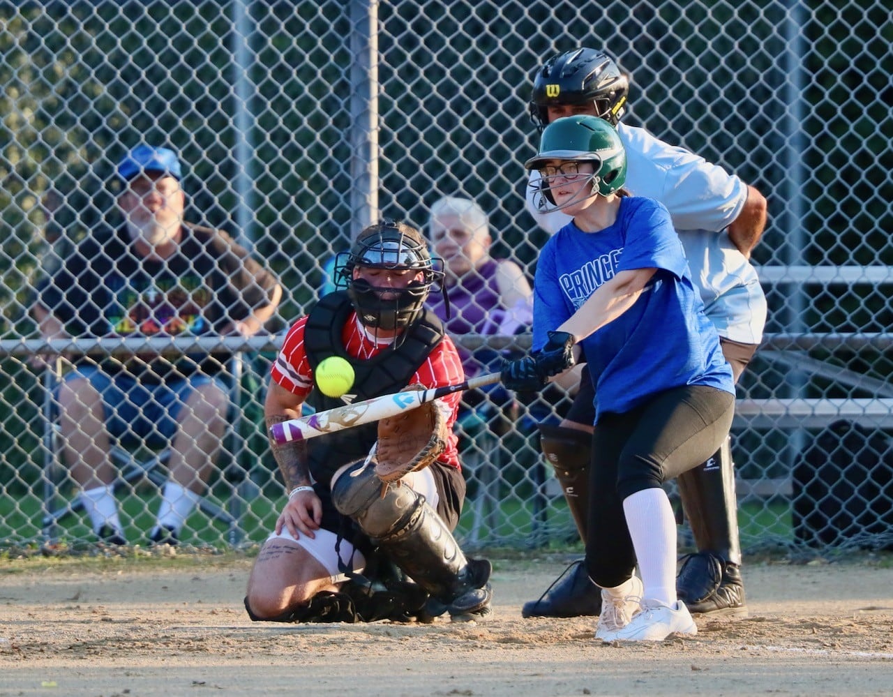 People Church's Neveah Briddick takes her swing in Friday's Princeton Park District Fastpich League tournament play at Westside Park.