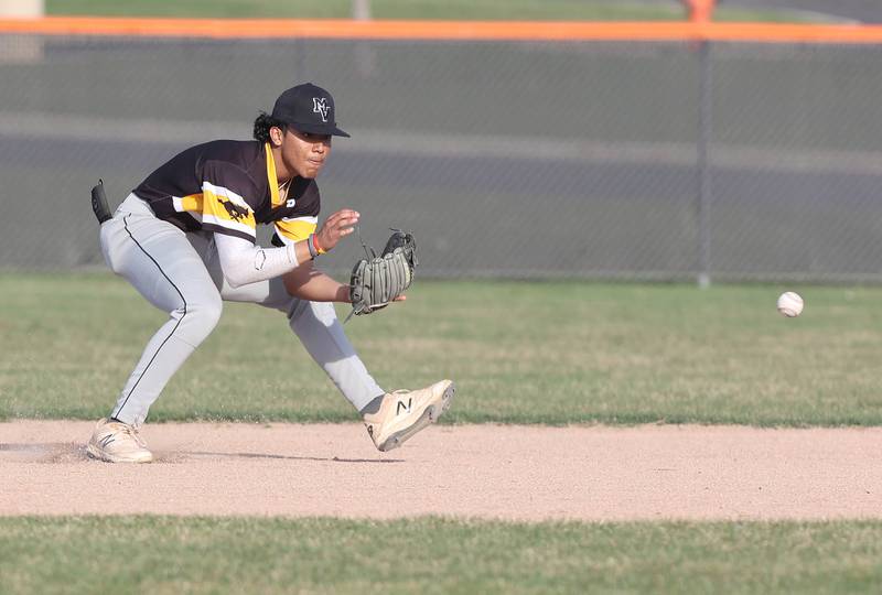 Metea Valley's Daniel Bastidas fields a ground ball during their game Thursday, April 13, 2023, at DeKalb High School.