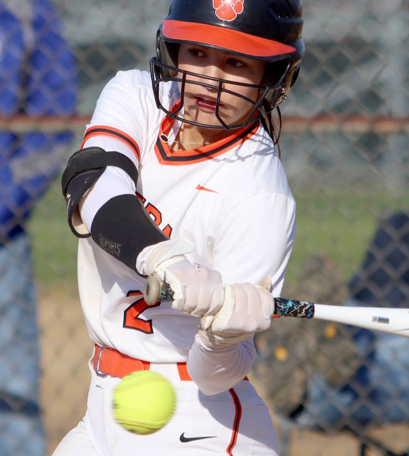 Crystal Lake Central’s Ella Arana makes contact against Woodstock North in varsity softball at Crystal Lake Friday.