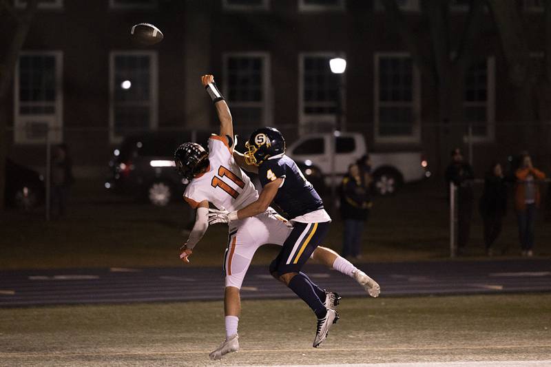 United Township’s Aden Struble has a pass broken up by Sterling’s Isaiah Mendoza Friday, Oct. 21, 2022.