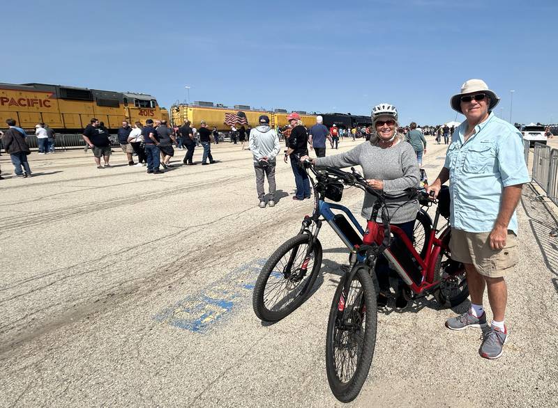 Gary and Jackie Chesney, of Richmond, Illinois, parked their car in Rochelle and rode their e-bikes 2.5 miles to the UP Global II terminal to see the Big Boy 4014 vintage steam locomotive on Sunday, Sept. 8, 2024.