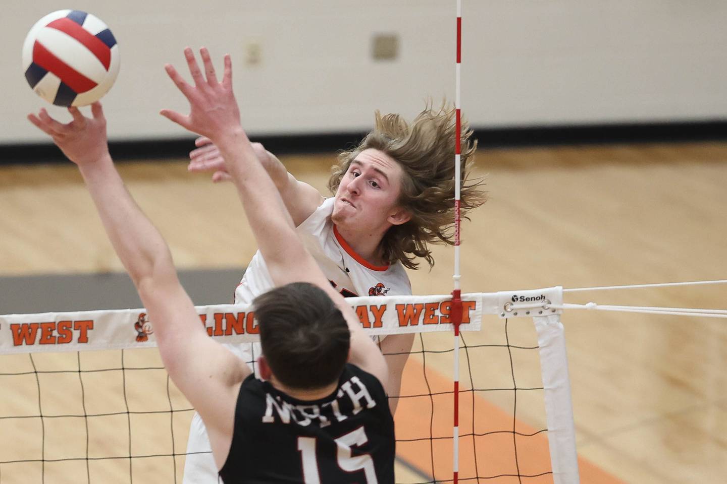 Lincoln-Way West’s Connor Jaral powers a shot against Plainfield North on Monday, March 18, 2024 in New Lenox.