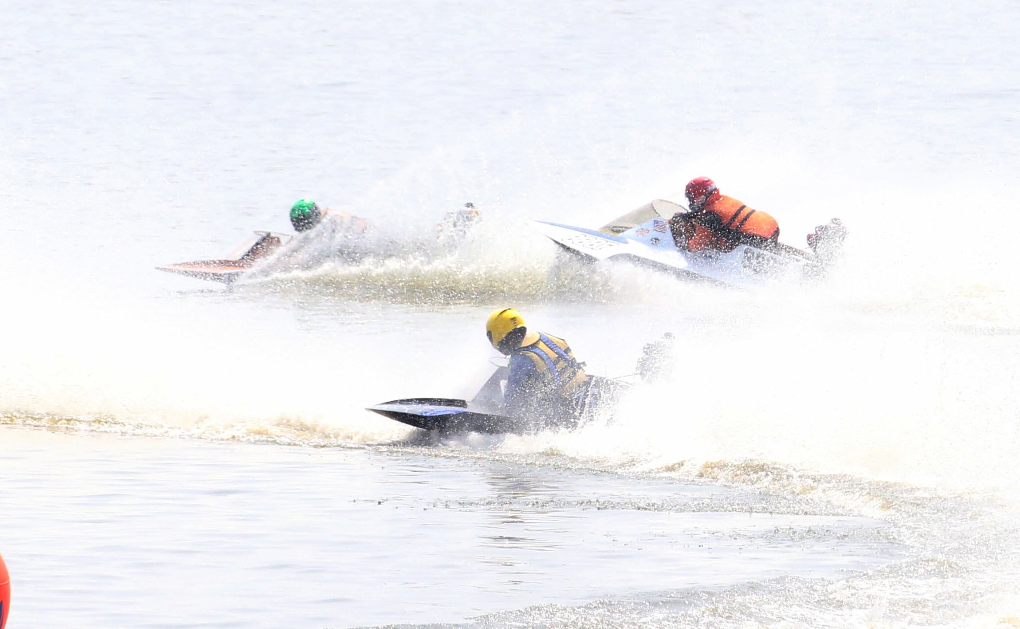 Racers make a turn in the OSY-400 race during the US Title Series Pro National Championship Boat Races on Friday, July 26, 2024 at Lake DePue.