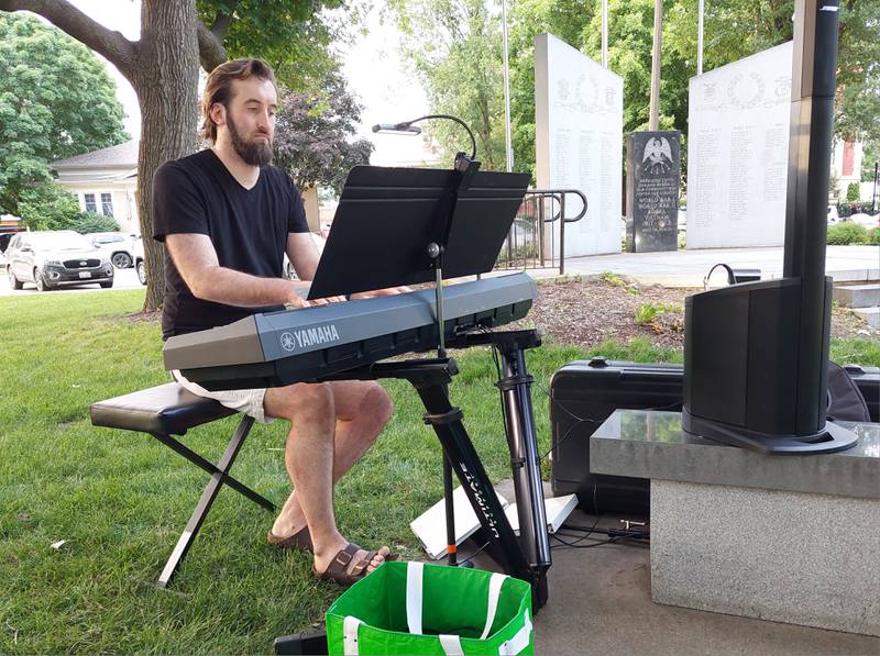 Matt Makeever, of Trinity Lutheran ELCA, Ottawa, played the keyboard Friday, June 7, 2024, during Pride Night of Remembrance at Washington Square in Ottawa.