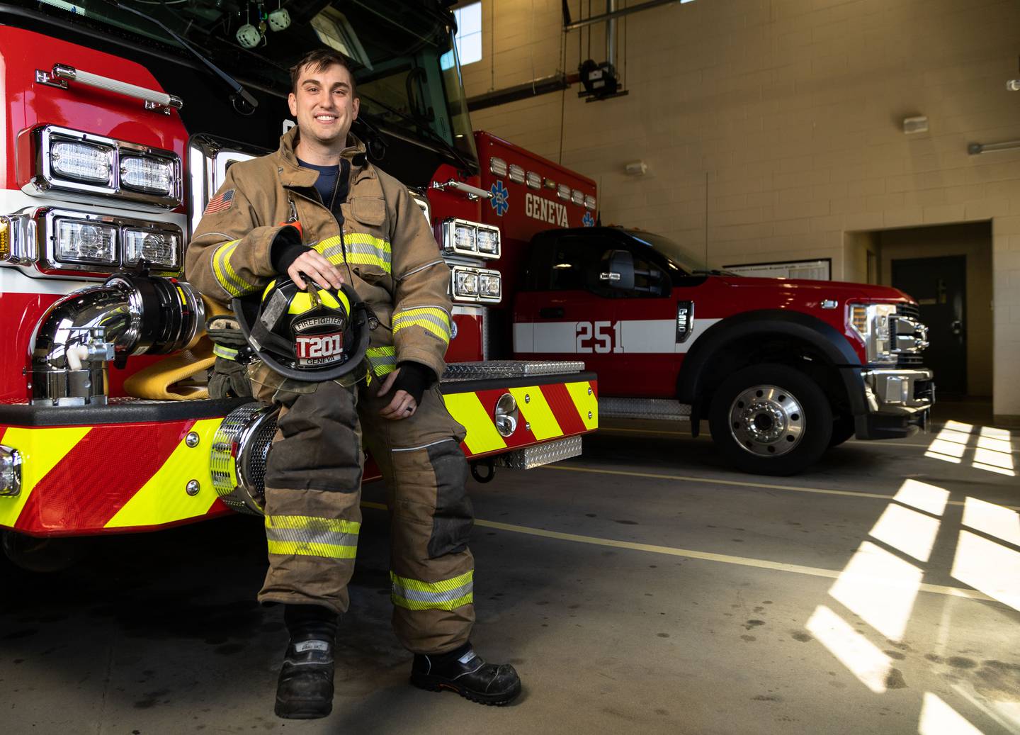 Geneva firefighter paramedic Kristofer Leeseberg poses for a photo at Geneva Fire Department Station One on Saturday, March 23, 2024.