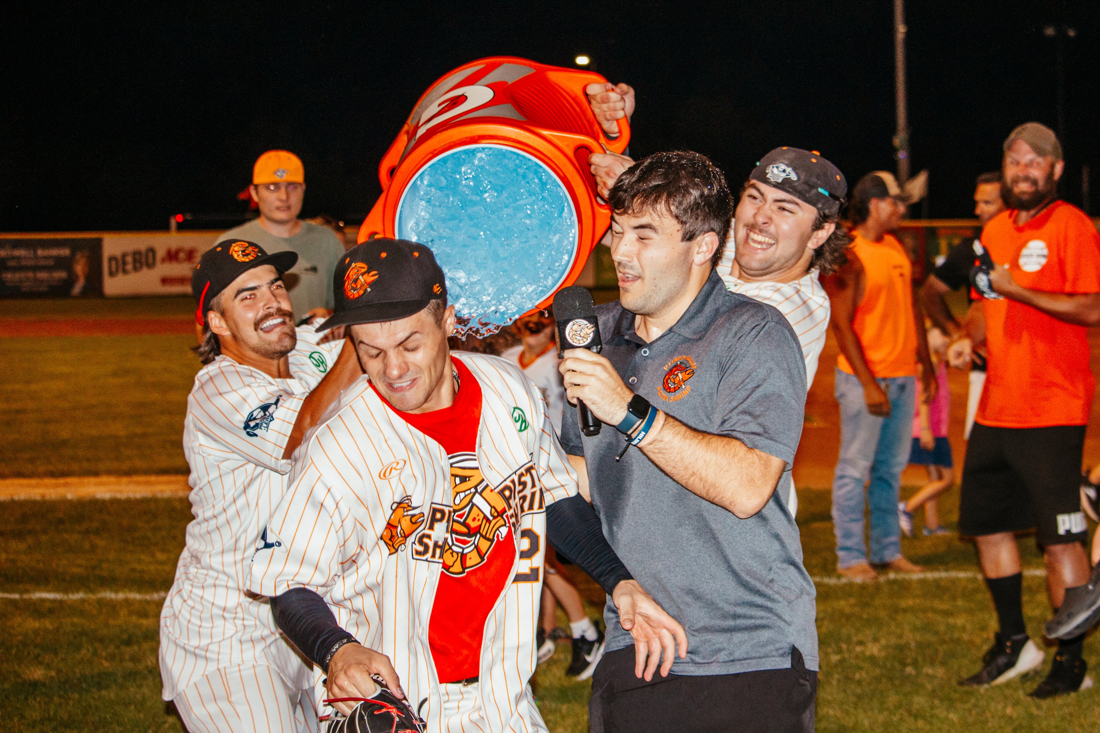 Illinois Valley Pistol Shrimp players celebrate winning the Northwest Division championship on Thursday, Aug. 1, 2024, at Schweickert Stadium at Veterans Park in Peru.