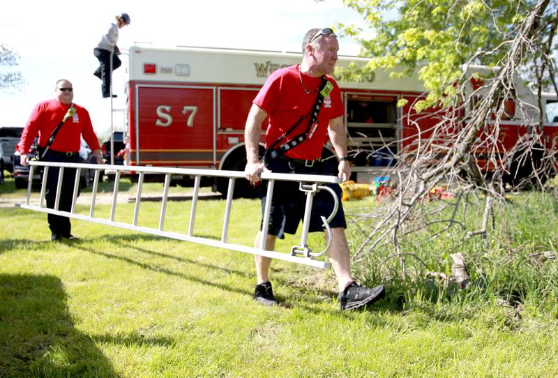 The Kane County Technical Rescue Team, which is made up of fire and medic responders from Elburn, Geneva, St. Charles, North Aurora, St. Charles, Aurora, Batavia and West Chicago, participate in a trench rescue training exercise in Geneva on Friday, May 10, 2024.