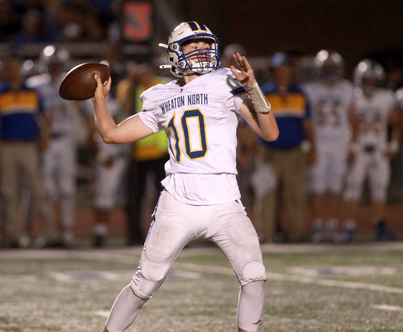 Wheaton North quarterback Nick Johnson throws the ball during a game Friday, Sept. 13, 2024 at St. Charles North.