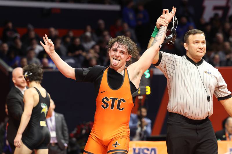 St. Charles East’s celebrates his win over Jayden Colon Evan Gosz in the 144-pound Class 3A state championship match on Saturday, Feb. 17th, 2024 in Champaign.