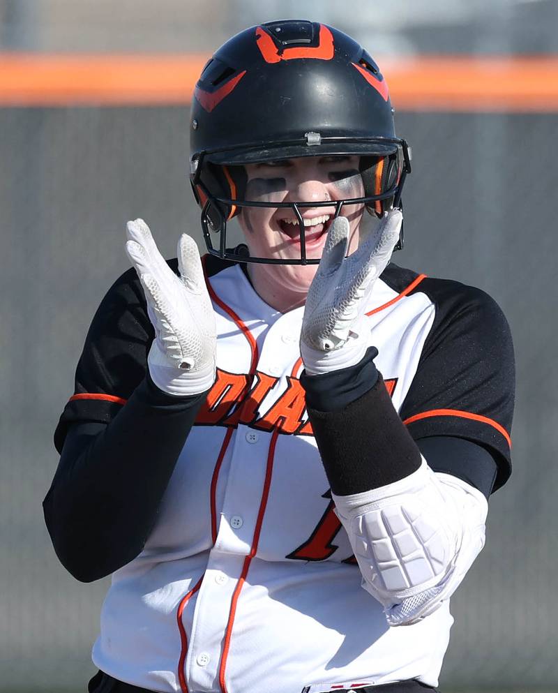 Sandwich's Alexis Sinetos applauds after hitting a double during their game against DeKalb Tuesday, March 19, 2024, at DeKalb High School.