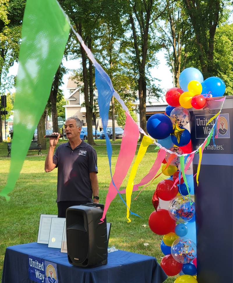 United Way of Eastern La Salle County board chairman Jeff Hettrick handles the master of ceremonies role for United Way Day, the official kick-off for its 2024 campaign held at Washington Square Park in Ottawa on Tuesday morning.