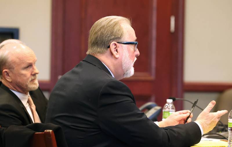 Douglas Moeller, (right) former DeKalb School District 428 superintendent, asks a question of Circuit Court Judge Philip Montgomery after his sentencing Tuesday, Jan. 1, 2023, at the DeKalb County Courthouse in Sycamore. Moeller was sentenced to community service after being found guilty of one count of non-consensual dissemination of a private sexual image, a class 4 felony.