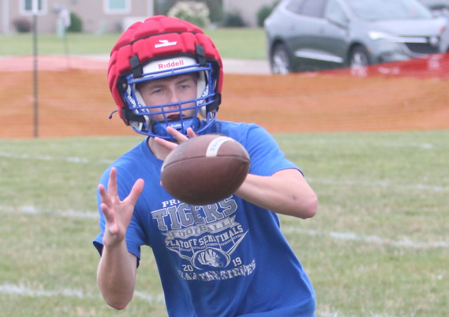 Princeton quarterback Will Lott, catches a snap during the first day of football practice on Monday, Aug. 12, 2024 at Little Siberia Field in Princeton.