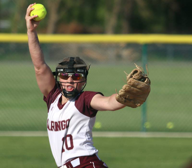 Marengo’s Lilly Kunzer delivers against Richmond-Burton in varsity softball at Marengo Monday.