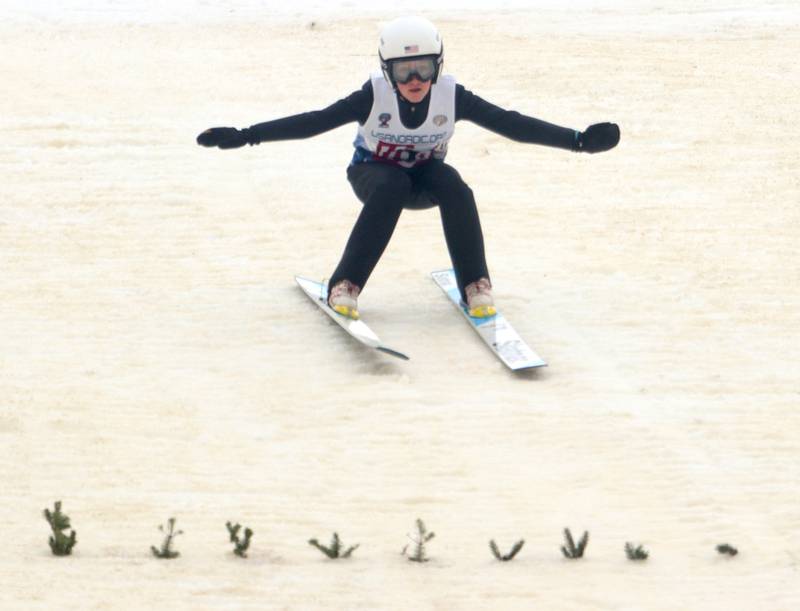 Kaija Copenhaver of Ishpeming Ski Club comes in for a landing during the 119th Norge Annual Winter Ski Jump Tournament in Fox River Grove Sunday.