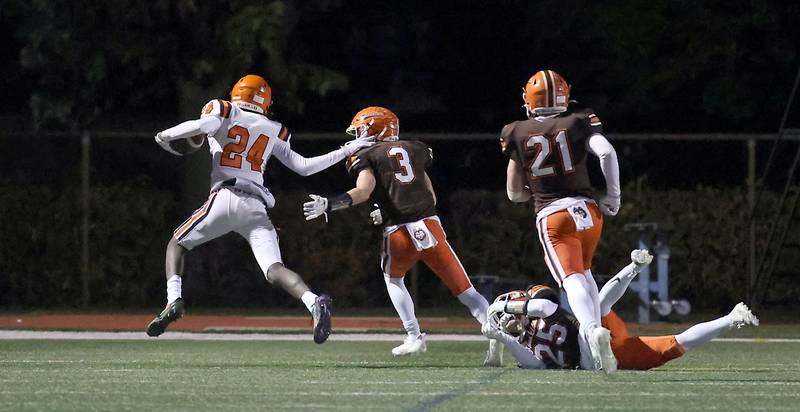 Wheaton Warrenville South's Amari Williams (24) heads in for a touchdown late in the fourth quarter during the IHSA Class 7A playoffs Saturday October 28, 2023 in Arlington Heights.