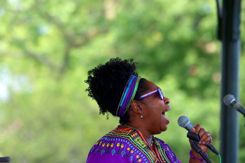 Darlene Benton sings “Lift Every Voice and Sing” during McHenry County’s 2nd Annual Juneteenth Festival at the Woodstock Square Saturday.