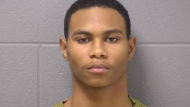 Bond lowered for man charged over Joliet gun battle