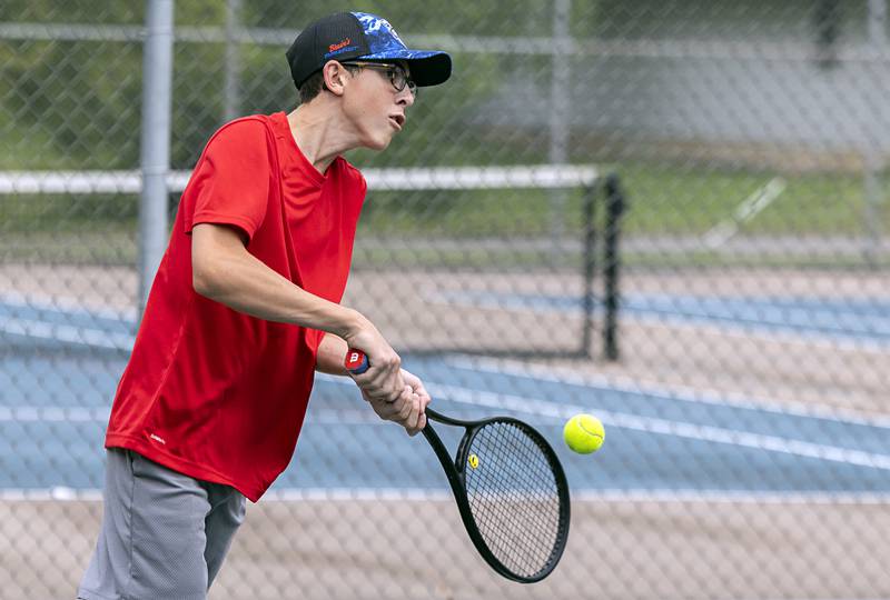 Gavin Staats returns a shot Wednesday, July 27, 2023 while playing mixed doubles in the Emma Hubbs Tennis Classic in Dixon.