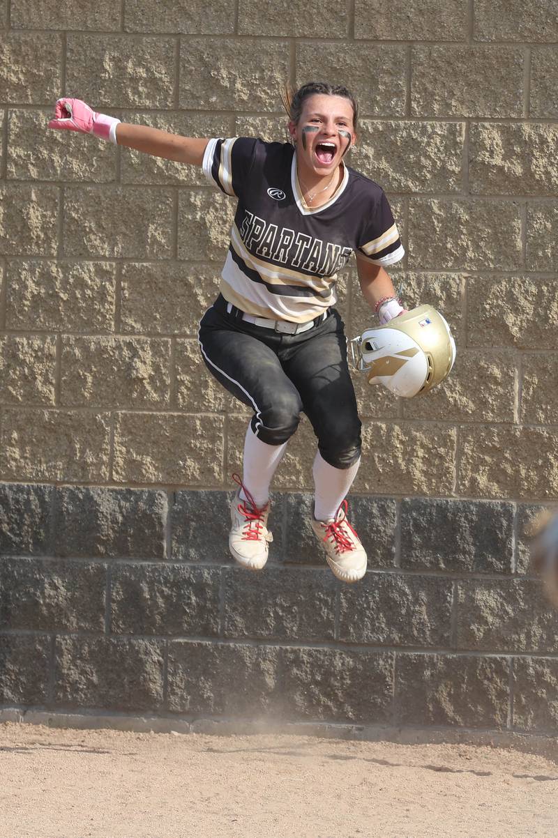 Sycamore's Faith Heil is fired up after teammate Kairi Lantz singled during their Class 3A sectional final against Prairie Ridge Friday, May 31, 2024, at Sycamore High School.