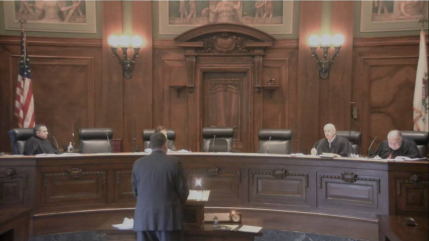 McHenry County State's Attorney's Office lawyer Norm Vinton argues in front of the Illinois Supreme Court on Jan. 19, 2022, on behalf of McHenry County Clerk Joe Tirio, who is challenging an appellate court ruling that he erred by keeping a McHenry Township ballot question that sought to abolish the local government from being decided by voters in the November 2020 election. He struck the referendum from the ballot because state law prohibits identical ballot questions from being asked in the same 23-month period, and McHenry Township voters turned down an effort to dissolve the agency just months before the fall 2020 election.