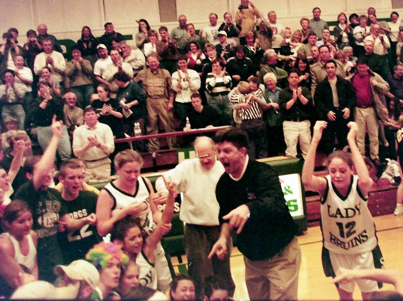 Members of the 2000 St. Bede Lady Bruins celebrate winning the Class 1A Regional title in 2000 at St. Bede Academy.