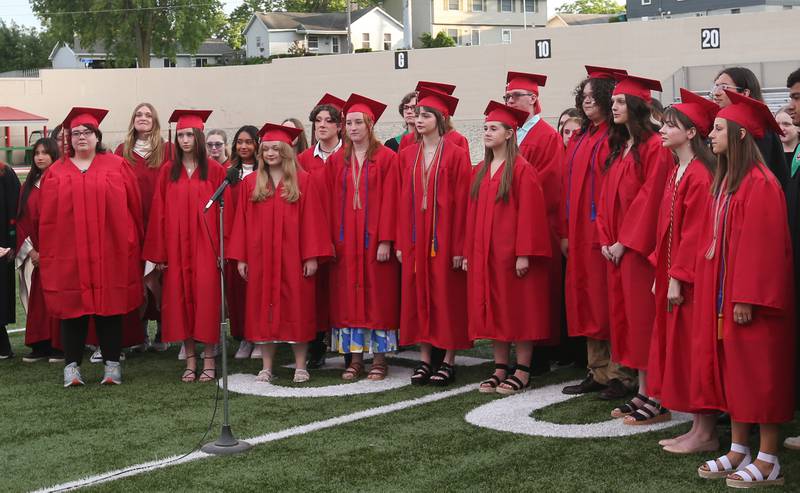 La Salle-Peru Township High School class of 2024 students sing in the choir during the 126th annual commencement graduation ceremony on Thursday, May 16, 2024 in Howard Fellows Stadium.