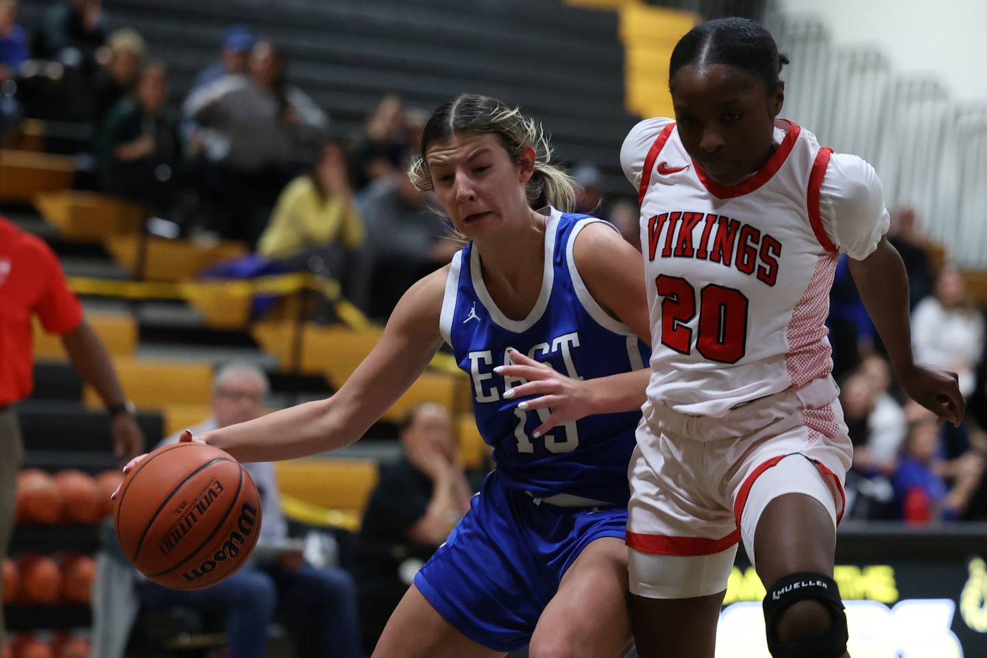 Lincoln-Way East’s Lilly Dockemeyer battles to the paint against Homewood-Flossmoor’s Jaeda Murphy in the Class 4A Joliet West Sectional championship on Thursday, Feb. 22nd in Joliet.