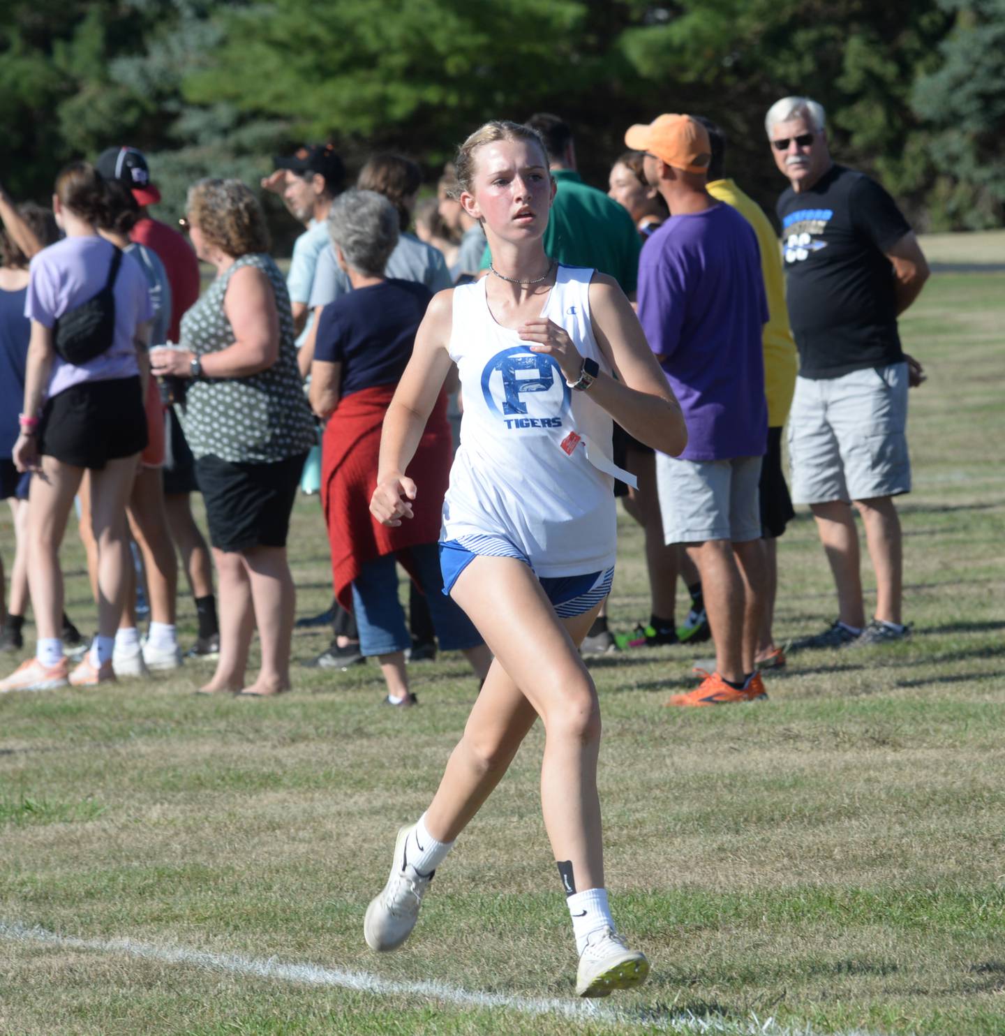 Princeton's Payton Frueh races to the finish line at the Oregon Open Cross Country Meet at Oregon High School on Saturday, Sept. 2, 2023. Frueh finished 22nd out of 122 runners in 22:37.