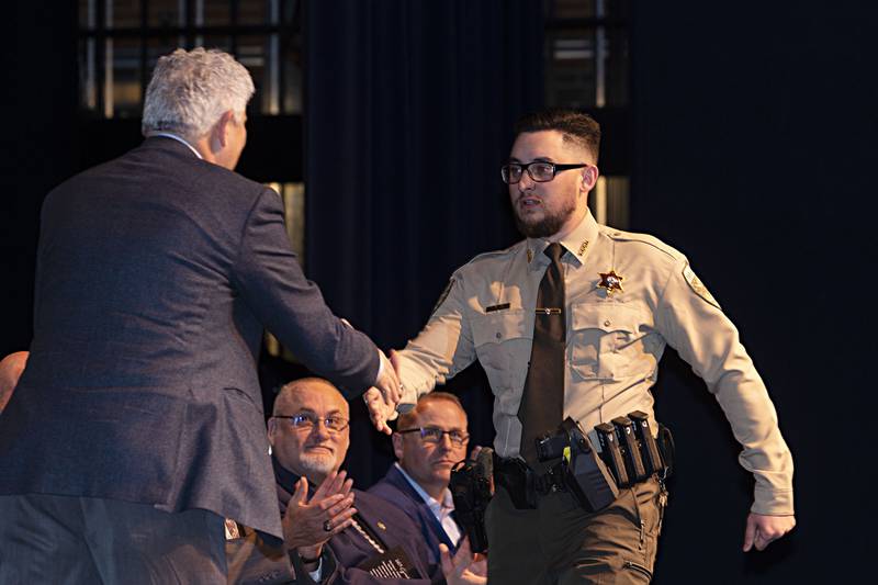 SVCC police academy graduate Alejandro Castro receives his certificate for completion of the course at SVCC Friday, April 14, 2023. Castro will serve with the Lee County Sheriff’s Office.