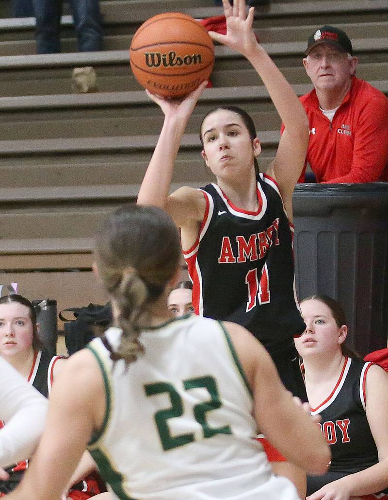 Amboy's Tyrah Vaessen shoots a jump shot over St. Bede's Ella Hermes during the Class 1A Regional final game on Friday, Feb. 16, 2024 at Marquette High School.