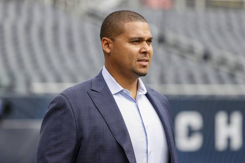 Chicago Bears general manager Ryan Poles walks on the field prior a game between the Bears and Houston Texans, Sunday, Sept. 25, 2022, in Chicago.