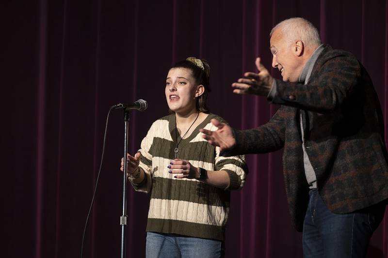 Franc D’Ambrosio helps Dixon High School student Olivia Payne with her rendition of “Green Finch and Linnet Bird” on Thursday, Feb. 15, 2024. The song is from “Sweeney Todd”, which was D’Ambrosio’s first Broadway show.