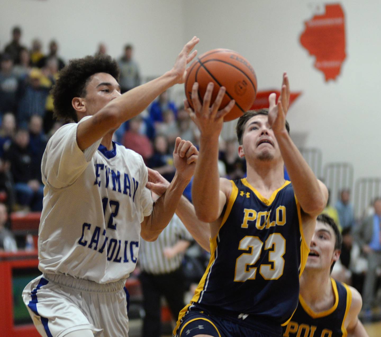 Polo's Noah Dewey (23) drives to the basket as Newman's Isaiah Williams tries to catch him in the final minute on Wednesday, Feb. 21, 2024 at the 1A Forreston Regional at Forreston High School. Polo won the game 44-37.